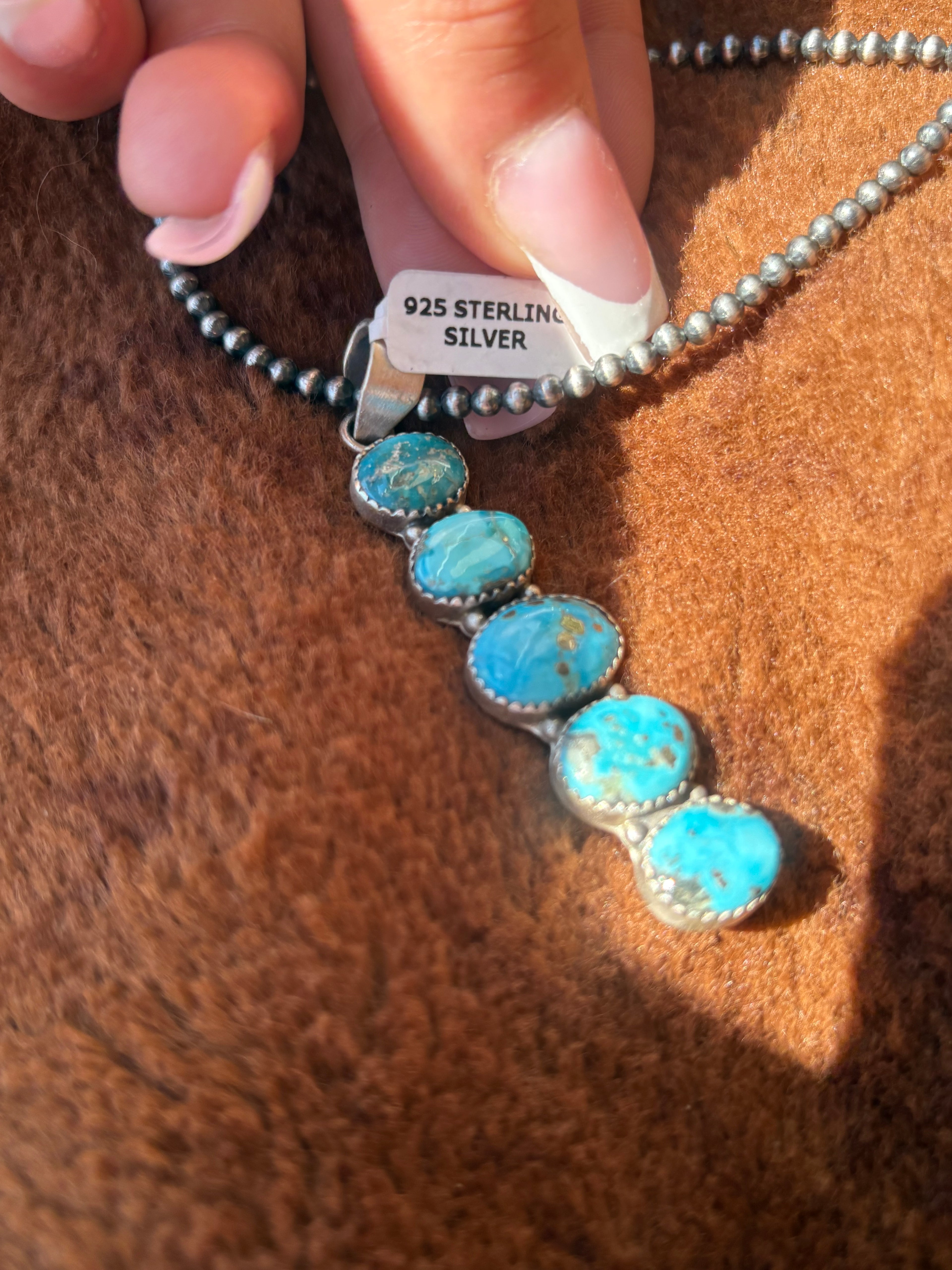 Blue bird pendant