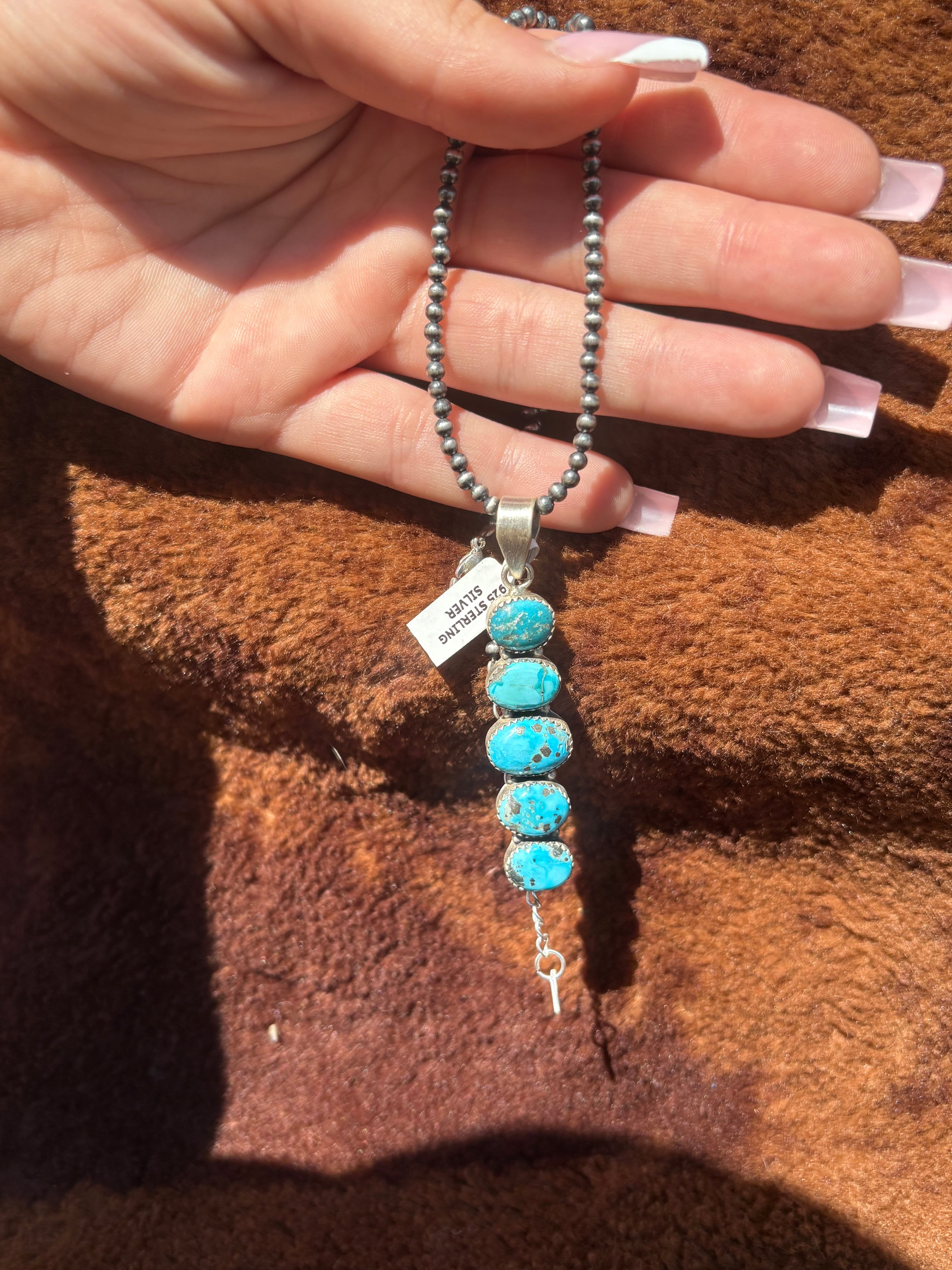 Blue bird pendant