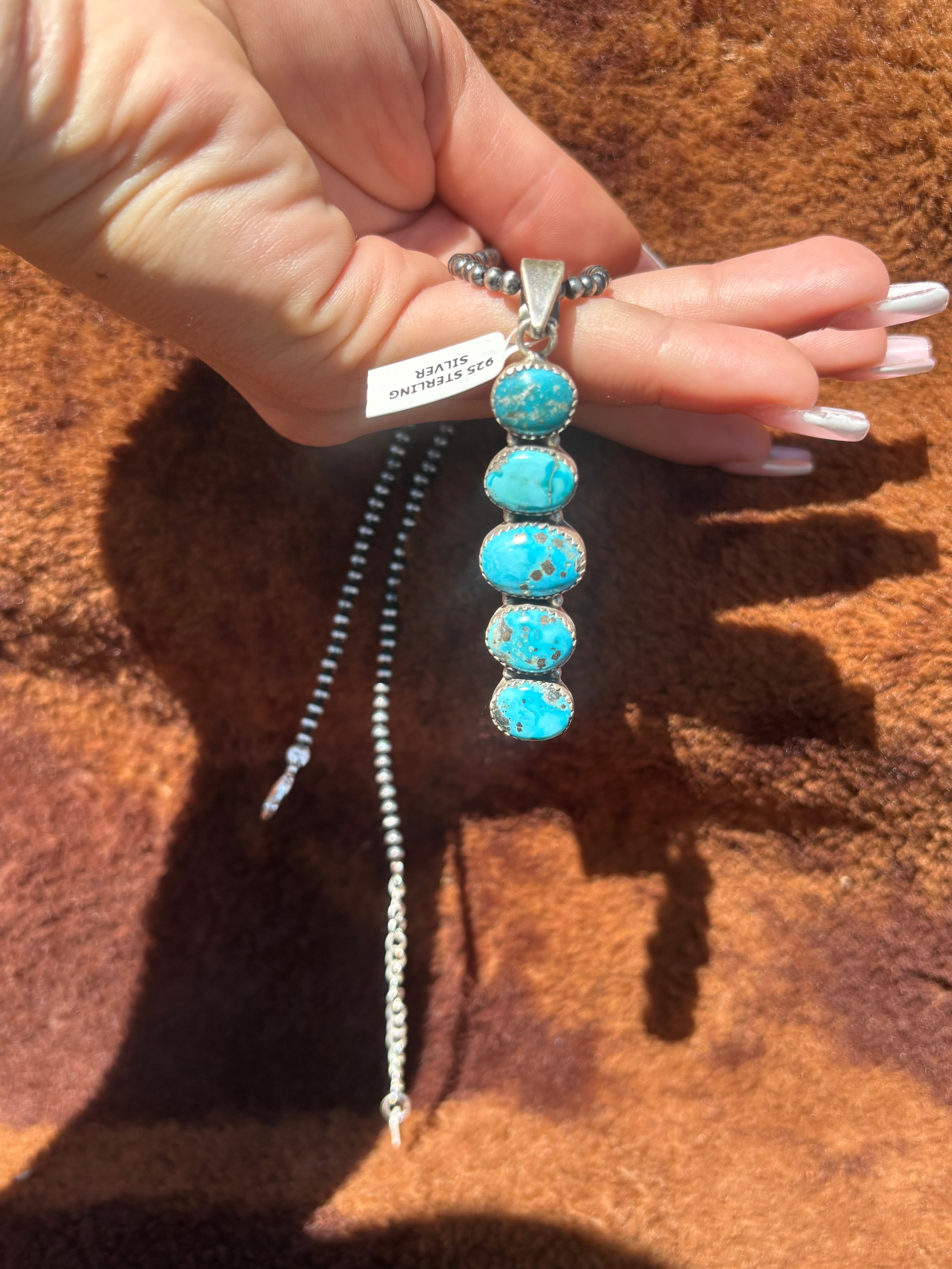Blue bird pendant