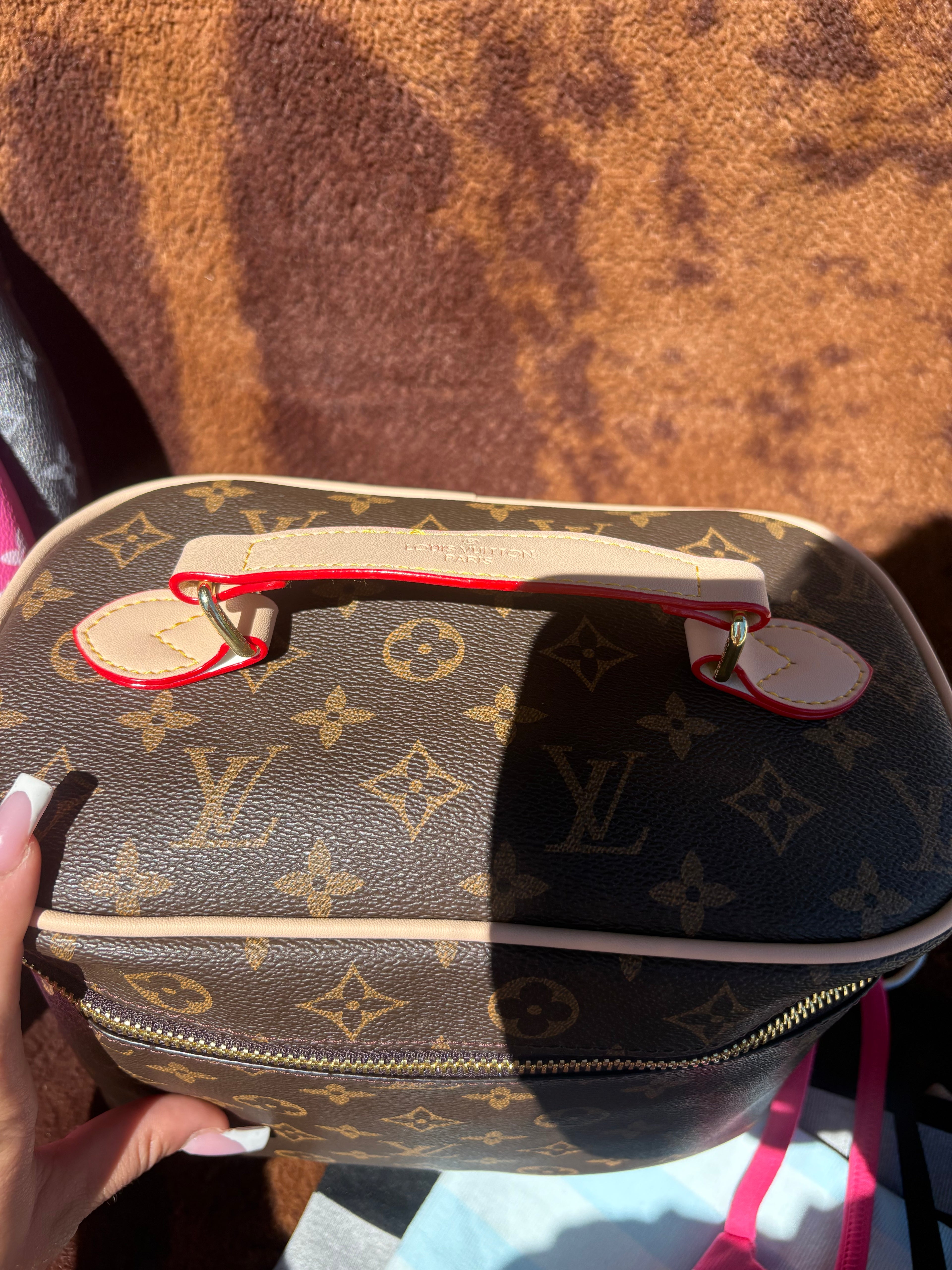 LV makeup bag